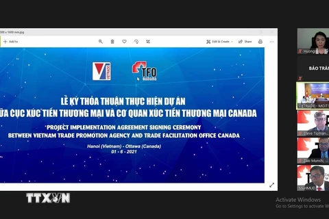 Lễ ký kết được tổ chức dưới hình thức trực tuyến, có sự tham gia của Thương vụ Việt Nam tại Canada và Đại sứ quán Canada tại Việt Nam. (Ảnh: Vũ Quang Thịnh/TTXVN)