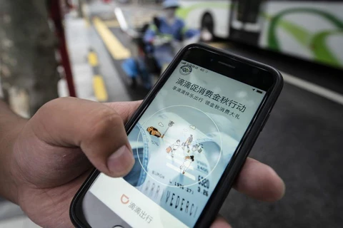 Ứng dụng đặt xe của Didi Global Inc trên điện thoại tại Trung Quốc. (Nguồn: Bloomberg) 