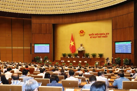 Quốc hội biểu quyết thông qua Nghị quyết về cơ cấu tổ chức của Chính phủ nhiệm kỳ 2021-2026. (Ảnh: Phương Hoa/TTXVN) 