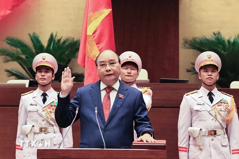 Chủ tịch nước Nguyễn Xuân Phúc tuyên thệ nhậm chức. (Ảnh: Thống Nhất/TTXVN) 