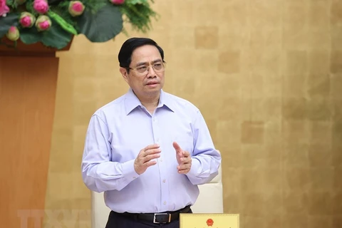 Thủ tướng Phạm Minh Chính chủ trì hội nghị. (Ảnh: Dương Giang/TTXVN) 