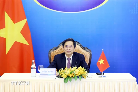 Bộ trưởng Bộ Ngoại giao Bùi Thanh Sơn dự Hội nghị Hợp tác Mekong-Nhật Bản lần thứ 14 theo hình thức trực tuyến. (Ảnh: Phạm Kiên/TTXVN) 