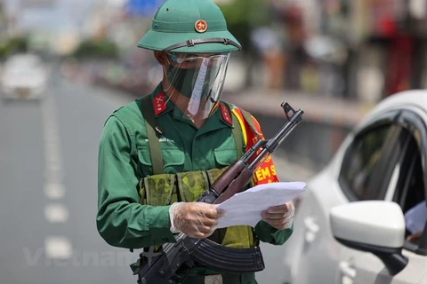 Lực lượng quân đội hỗ trợ chống dịch ở TP.HCM. (Ảnh: Ngô Trần Hải An/Vietnam+) 