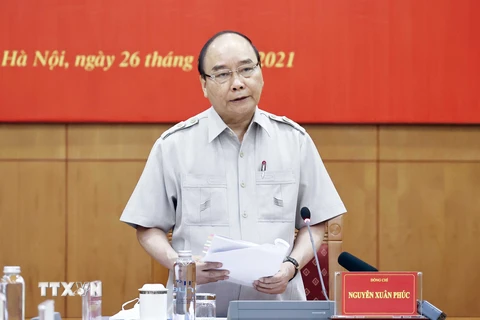 Chủ tịch nước Nguyễn Xuân Phúc, Trưởng Ban Chỉ đạo cải cách Tư pháp Trung ương phát biểu tại phiên họp. (Ảnh: Thống Nhất/TTXVN) 