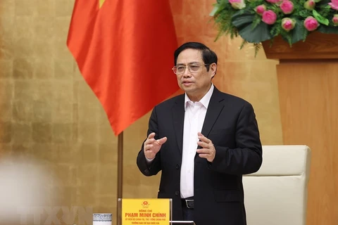 Thủ tướng Phạm Minh Chính chủ trì sơ kết công tác phòng, chống dịch COVID-19 trong đợt bùng phát lần thứ 4. (Ảnh: Dương Giang/TTXVN) 