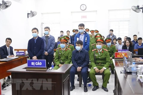 Xét xử bị cáo Nguyễn Đức Chung và đồng phạm về tội chiếm đoạt tài liệu bí mật nhà nước. (Ảnh: Doãn Tấn/TTXVN)