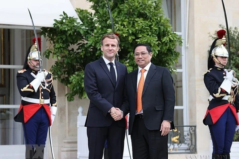 Thủ tướng Phạm Minh Chính hội kiến Tổng thống Emmanuel Macron trong chuyến thăm chính thức Cộng hoà Pháp (4/11/2021). (Ảnh: Dương Giang/TTXVN) 
