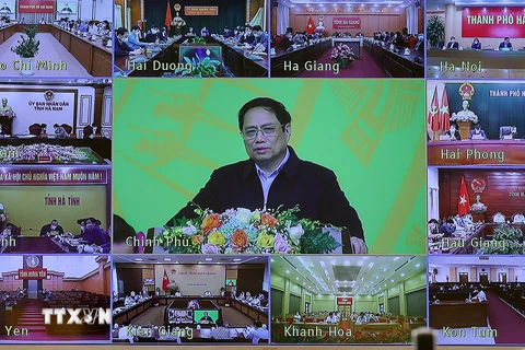 Hội nghị được tổ chức trực tuyến từ Chính phủ đến các bộ, ngành và các tỉnh, thành phố trực thuộc trung ương. (Ảnh: Dương Giang/TTXVN) 