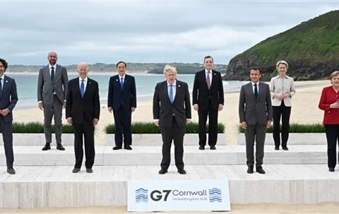 Các đại biểu chụp ảnh chung tại Hội nghị thượng đỉnh G7 ở Cornwall (Anh) năm 2021. (Ảnh: AFP/TTXVN)