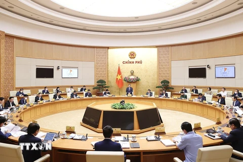 Thủ tướng Chính phủ Phạm Minh Chính chủ trì phiên họp Chính phủ thường kỳ tháng 3/2022. (Ảnh: Dương Giang/TTXVN) 