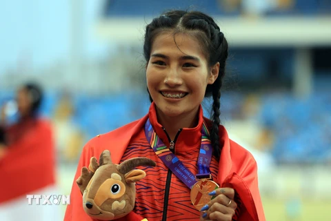 Vận động viên Khuất Phương Anh (Việt Nam) - Huy chương vàng nội dung chạy 800m nữ. (Ảnh: Huy Hùng/TTXVN)