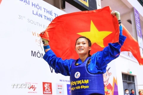 Vận động viên đội tuyển Vovinam Việt Nam Đỗ Phương Thảo giành huy chương Vàng ở nội dung đối kháng hạng cân 65kg nữ. (Ảnh: Tuấn Anh/TTXVN)