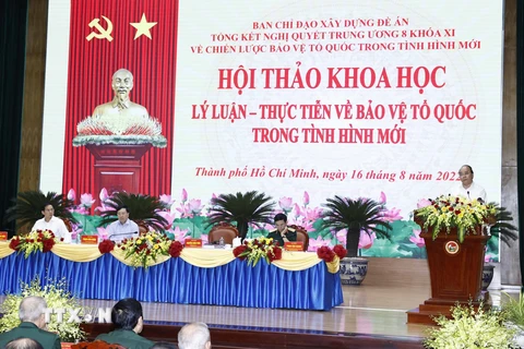 Chủ tịch nước Nguyễn Xuân Phúc chủ trì hội thảo. (Ảnh: Thống Nhất/TTXVN)