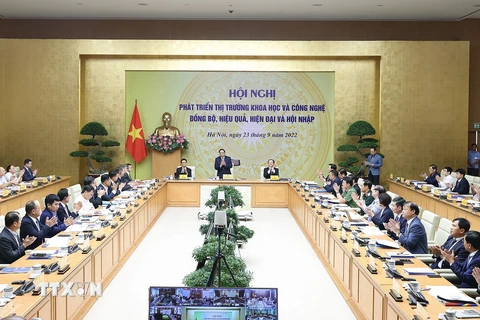 Thủ tướng Phạm Minh Chính chủ trì hội nghị phát triển thị trường khoa học và công nghệ. (Ảnh: Dương Giang/TTXVN) 