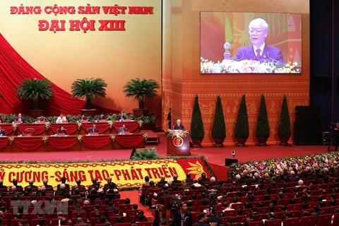 Tổng Bí thư Ban Chấp hành Trung ương Đảng Nguyễn Phú Trọng đọc Báo cáo chính trị của Ban Chấp hành Trung ương Đảng khóa XII và các văn kiện trình Đại hội Đảng XIII. (Ảnh: TTXVN)