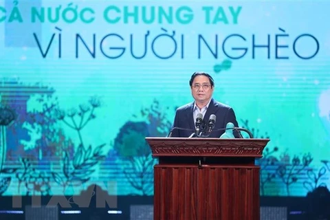 Thủ tướng Phạm Minh Chính phát biểu, vận động ủng hộ giúp đỡ người nghèo nhân Tháng cao điểm Vì người nghèo năm 2022. (Ảnh: Dương Giang/TTXVN)