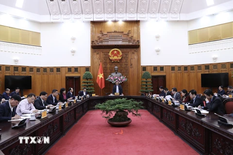 Thủ tướng Phạm Minh chính chủ trì họp Thường trực Chính phủ về chính sách tài khoá, tiền tệ. Ảnh: Dương Giang-TTXVN 