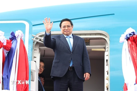 Thủ tướng Phạm Minh Chính rời thủ đô Vientiane, kết thúc chuyến thăm chính thức và làm việc tại Lào. (Ảnh: Dương Giang/TTXVN)