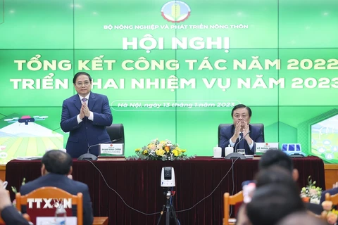 Thủ tướng Phạm Minh Chính và Bộ trưởng Bộ Nông nghiệp và Phát triển Nông thôn Lê Minh Hoan chủ trì hội nghị. (Ảnh: Dương Giang/TTXVN) 