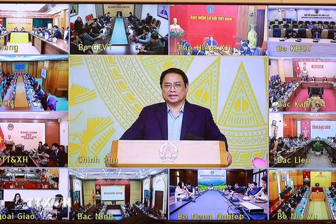 Sáng 25/2, tại Hà Nội,Thủ tướng Phạm Minh Chính, Chủ tịch Ủy ban Quốc gia về chuyển đổi số đã chủ trì phiên họp lần thứ 5 của Ủy ban, kết nối trực tuyến đến các bộ, ngành và địa phương trên cả nước. (Ảnh: Dương Giang/TTXVN) 