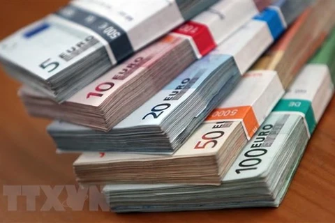 Đồng euro tại một ngân hàng ở Heidelberg, Đức. (Ảnh: AFP/TTXVN) 