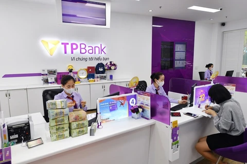 TPBank giảm lãi suất lần 5, hỗ trợ khách hàng 323 tỷ đồng lãi suất. (Nguồn: Vietnam+) 