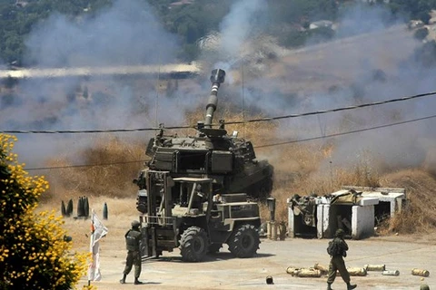 Quân đội Israel nã pháo vào khu vực biên giới Liban. (Nguồn: AFP)