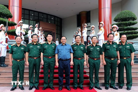 Thủ tướng Phạm Minh Chính và các lãnh đạo Bộ Quốc phòng dự hội nghị. (Ảnh: Trọng Đức/TTXVN) 