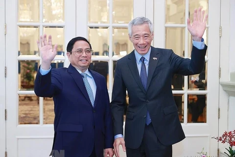  Thủ tướng Lý Hiển Long đón Thủ tướng Phạm Minh Chính thăm chính thức Singapore, ngày 9/2/2023. (Ảnh: Dương Giang/TTXVN)
