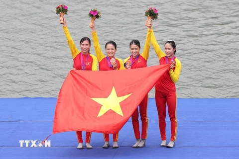 Đội Rowing Việt Nam giành Huy chương Đồng tại Asian Games 19 . (Ảnh: Hoàng Linh/TTXVN) 