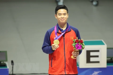 Thành tích ấn tượng của xạ thủ Quang Huy giúp Đoàn Thể thao Việt Nam có huy chương Vàng đầu tiên tại ASIAD 19. (Ảnh: TTXVN phát) 