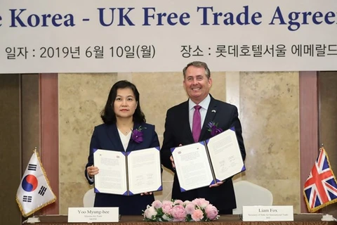 Lễ ký FTA giữa Anh-Hàn Quốc hồi năm 2019. (Ảnh: AFP/Yonhap)