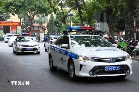 Lực lượng Cảnh sát Giao thông, Công an thành phố Hà Nội ra quân bảo đảm an ninh trật tự trước, trong và sau Tết Nguyên đán Giáp Thìn 2024. (Ảnh: Phạm Kiên/TTXVN)