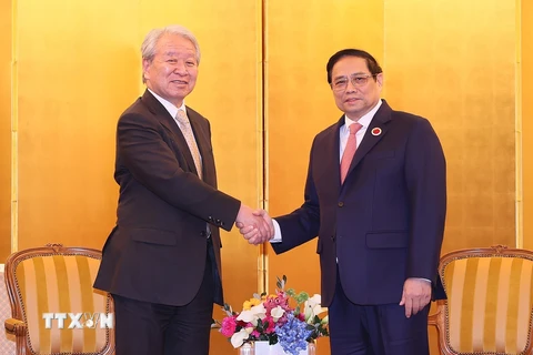 Thủ tướng Phạm Minh Chính tiếp Chủ tịch Cơ quan Hợp tác Quốc tế Nhật Bản Tanaka Akihiko. (Ảnh: Dương Giang/TTXVN)