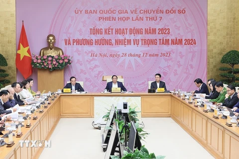 Chiều 28/12/2023, tại Hà Nội, Thủ tướng Phạm Minh Chính, Chủ tịch Ủy ban Quốc gia về Chuyển đổi Số chủ trì Phiên họp lần thứ 7 của Ủy ban để tổng kết hoạt động năm 2023 và phương hướng nhiệm vụ trọng tâm năm 2024. (Ảnh: Dương Giang/TTXVN)