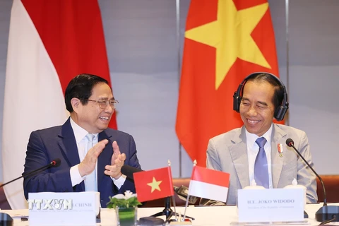 Thủ tướng Phạm Minh Chính và Tổng thống Joko Widodo đồng chủ trì Đối thoại doanh nghiệp cấp cao Việt Nam-Indonesia. (Ảnh: Dương Giang/TTXVN)