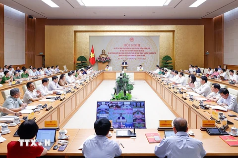 Thủ tướng Phạm Minh Chính chủ trì Hội nghị sơ kết 01 năm thực hiện tháo gỡ vướng mắc thực hiện Đề án 06. (Ảnh: Dương Giang/TTXVN)