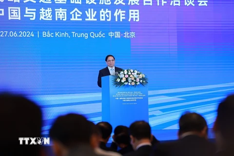 Thủ tướng Phạm Minh Chính phát biểu tại Hội nghị hợp tác Việt Nam-Trung Quốc về phát triển hạ tầng chiến lược giao thông. (Ảnh: Dương Giang/TTXVN)