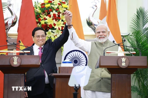 Thủ tướng Phạm Minh Chính​ và Thủ tướng Ấn Độ Narendra Modi sau khi kết thúc cuộc gặp gỡ báo chí hai nước. (Ảnh: Dương Giang/TTXVN)