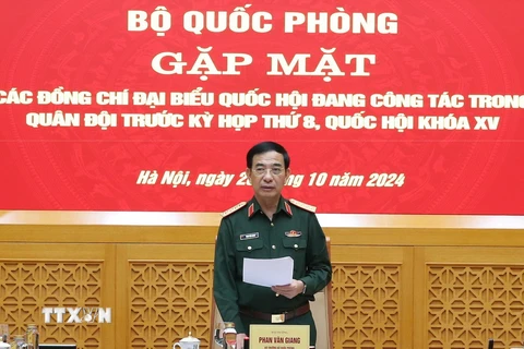 Đại tướng Phan Văn Giang chủ trì buổi gặp mặt. (Ảnh: Hồng Pha/TTXVN phát)