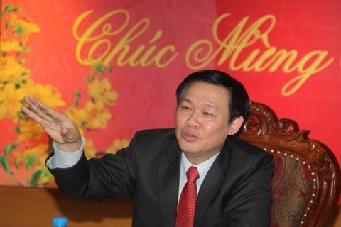 Trưởng ban Kinh tế Trung ương, Vương Đình Huệ trong buổi trao đổi cùng Vietnam+. (Ảnh: Vietnam+)