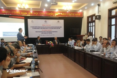 Hội thảo “Cơ quan chuyên trách đại diện chủ sở hữu Nhà nước đối với vốn Nhà nước tại doanh nghiệp: Kinh nghiệm quốc tế và bài học đối với Việt Nam,” ngày 23/8. (Ảnh: PV/Vietnam+)