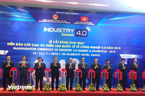 Lễ cắt băng khai mạc triển lãm quốc tế về công nghiệp, ngày 13/7. (Ảnh: PV/Vietnam+)