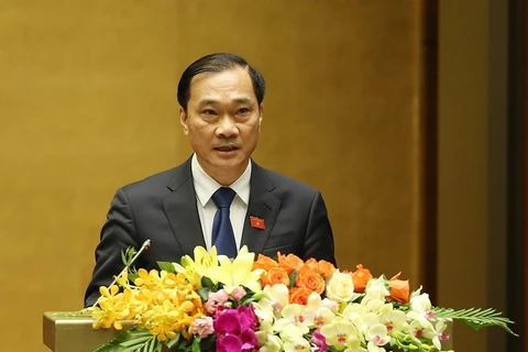 Chủ nhiệm Ủy ban Kinh tế của Quốc hội Vũ Hồng Thanh trình bày Báo cáo tại phiên họp sáng 20/5.