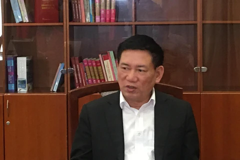 Bộ trưởng Bộ Tài chính - Hồ Đức Phớc trả lời phỏng vấn báo chí. (Ảnh: Vietnam+)