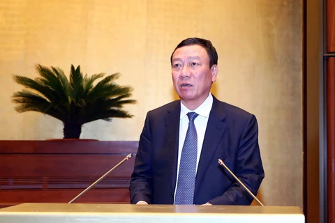Tổng Thanh tra Chính phủ Đoàn Hồng Phong trình bày Báo cáo về công tác phòng, chống tham nhũng năm 2022. (Ảnh: Phạm Kiên/TTXVN)