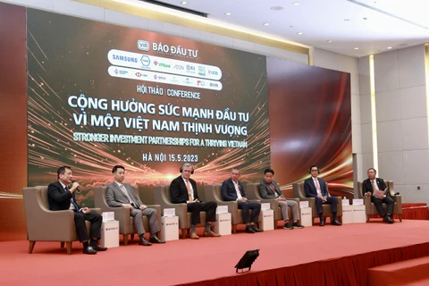 Phiên thảo luận tại hội thảo “Cộng hưởng sức mạnh đầu tư vì một Việt Nam thịnh vượng,” do Báo Đầu tư (Bộ Kế hoạch và Đầu tư) tổ chức ngày 15/5. (Ảnh" PV/Vietnam+)