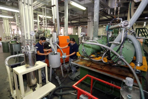 Ngành công nghiệp chế biến-chế tạo dẫn đầu với tổng vốn đầu tư đạt hơn 10,9 tỷ USD trong 7 tháng. (Ảnh minh họa: Vietnam+)