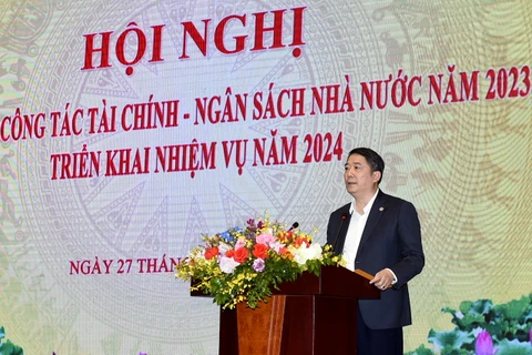 Năm 2023, tổng số tiền đã miễn, giảm, gia hạn thuế, phí, lệ phí và tiền thuê đất cho doanh nghiệp và người dân khoảng 193,4 nghìn tỷ đồng. (Ảnh: Vietnam+)