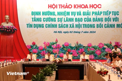 Hội thảo khoa học “Định hướng, nhiệm vụ và giải pháp tiếp tục tăng cường sự lãnh đạo của Đảng đối với tín dụng chính sách xã hội trong bối cảnh mới mới,” ngày 2/7. (Ảnh: Vietnam+)